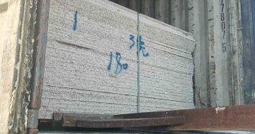 鹤岗 芝麻白花岗岩石材3.0公分光面毛板装柜出货