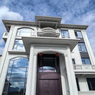 鹤岗白麻别墅外墙干挂石材效果示例