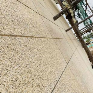 鹤岗 黄金麻花岗岩荔枝面外墙干挂石材效果示例