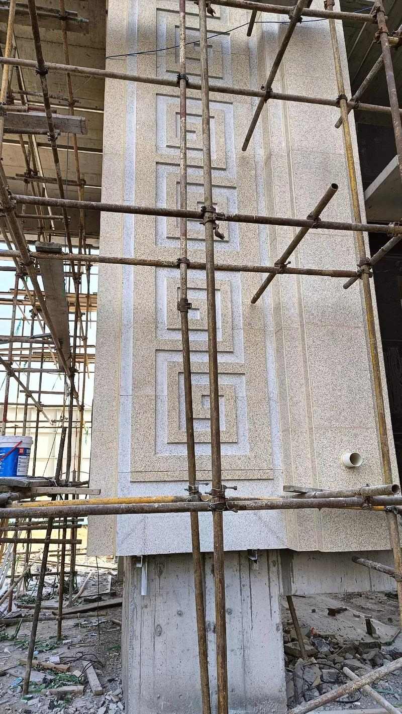 鹤岗 黄金麻花岗岩别墅外墙干挂回纹造型效果