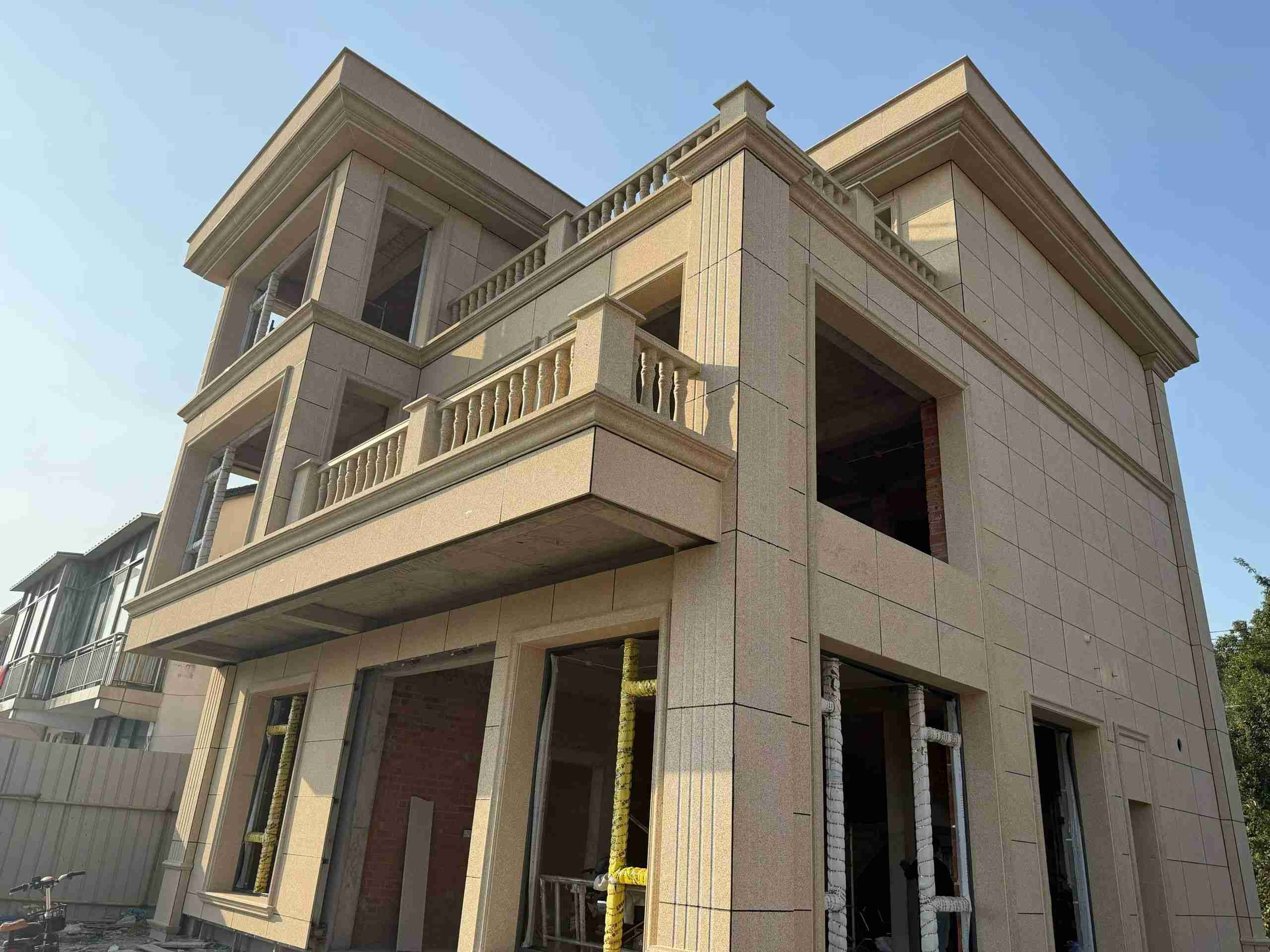 鹤岗 黄金麻花岗岩石材荔枝面外墙干挂效果展示